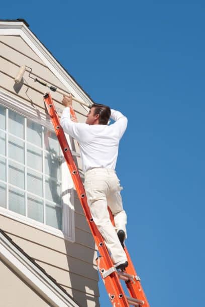 man weatherboard painting