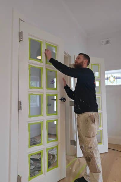 restoration painting services - painting a door