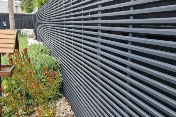 fence and airless spraying - painted fence