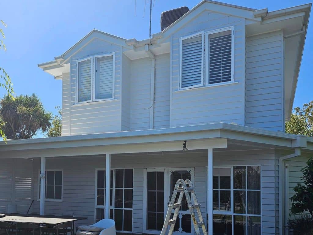 weatherboard painting - white weatherboard house